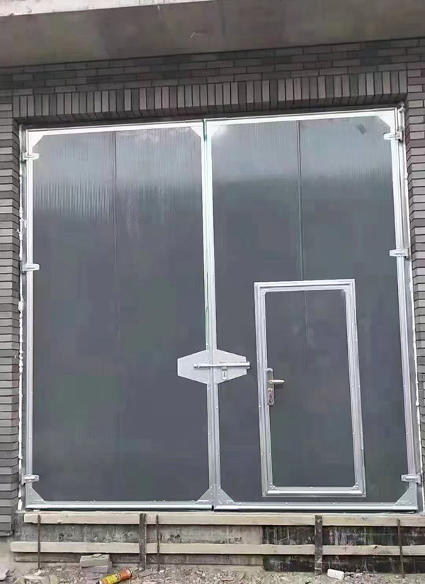 米脂工业平开门在大型设备制造车间的应用实例